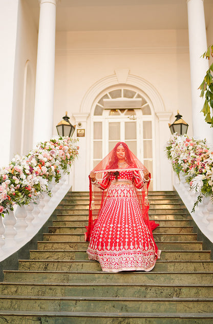 Bride: Urvashi Pandey in our Scarlet Red Embroidered Lehenga Set