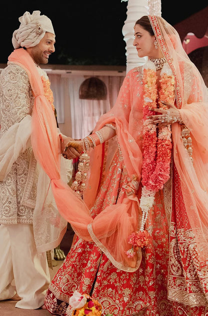 Bride: Nupur Sanon & Groom Stebin Ben in our Bespoke Ensemble