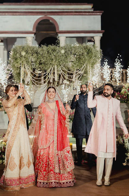 Bride: Nupur Sanon & Groom Stebin Ben in our Bespoke Ensemble