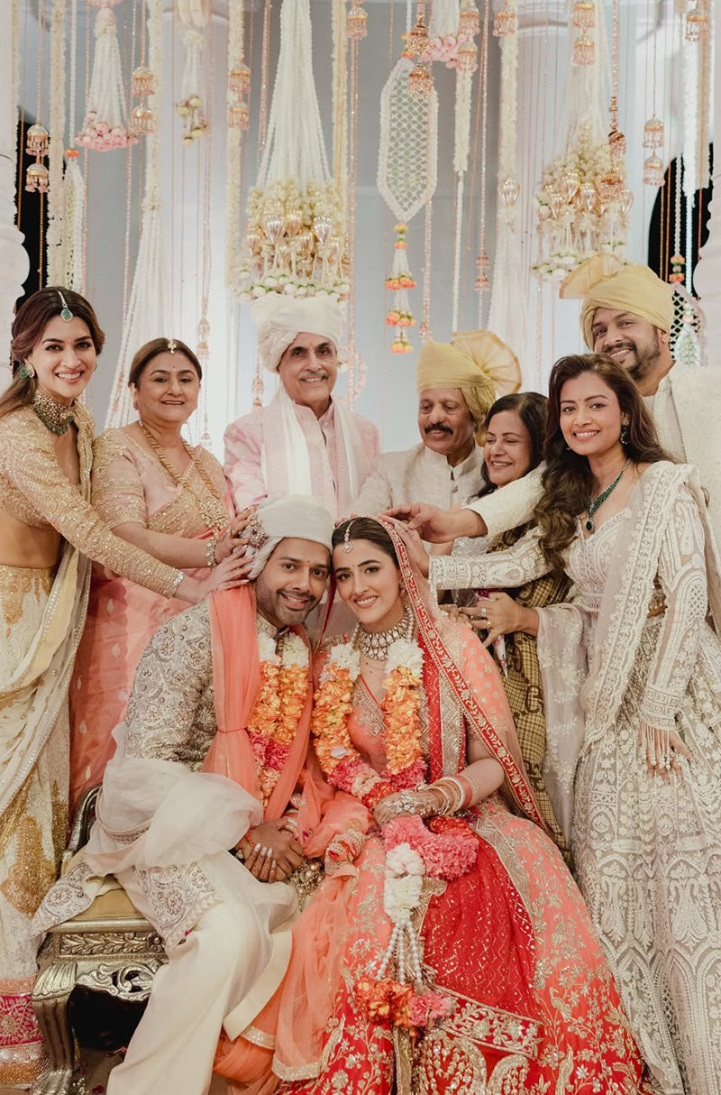 Bride: Nupur Sanon & Groom Stebin Ben in our Bespoke Ensemble