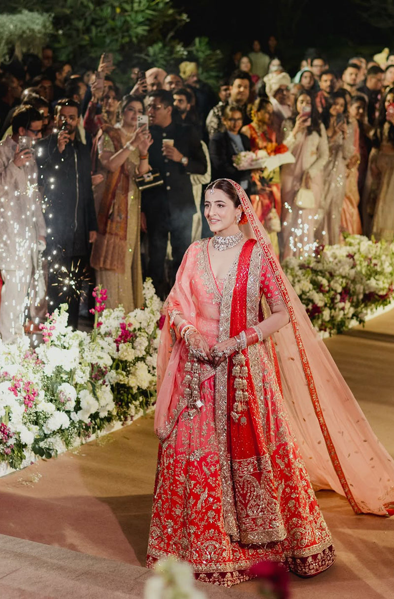 Bride: Nupur Sanon & Groom Stebin Ben in our Bespoke Ensemble