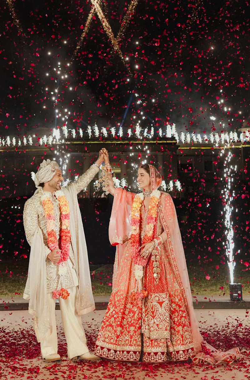 Bride: Nupur Sanon & Groom Stebin Ben in our Bespoke Ensemble