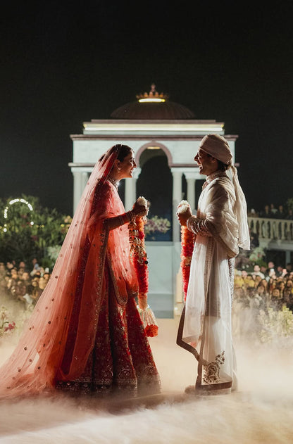 Bride: Nupur Sanon & Groom Stebin Ben in our Bespoke Ensemble