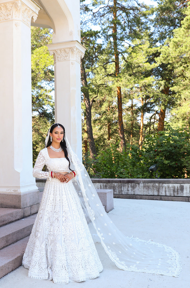 Bride: Dipika Sharma Chhura in our Ivory Embroidered Lehenga Set