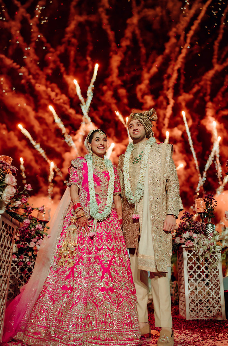 Bride: Gayatri Sarvaria & Groom Ranvir Sarvaria in our Wedding Ensemble