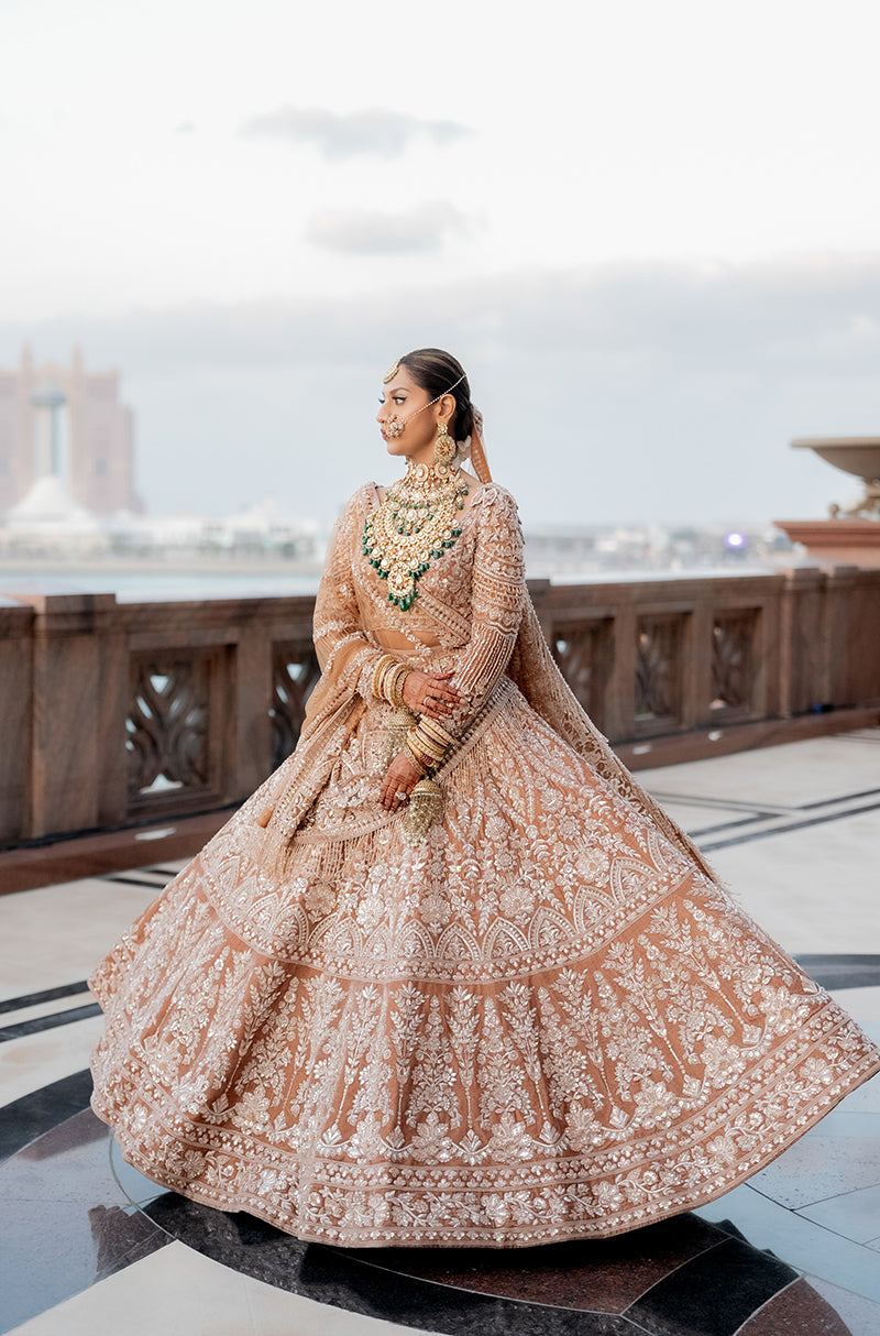 Bride: Muscaan Goenka in our Dusty Rose-Peach Embroidered Lehenga Set