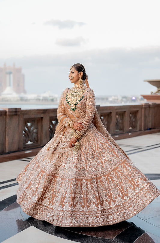 Bride: Muscaan Goenka in our Dusty Rose-Peach Embroidered Lehenga Set