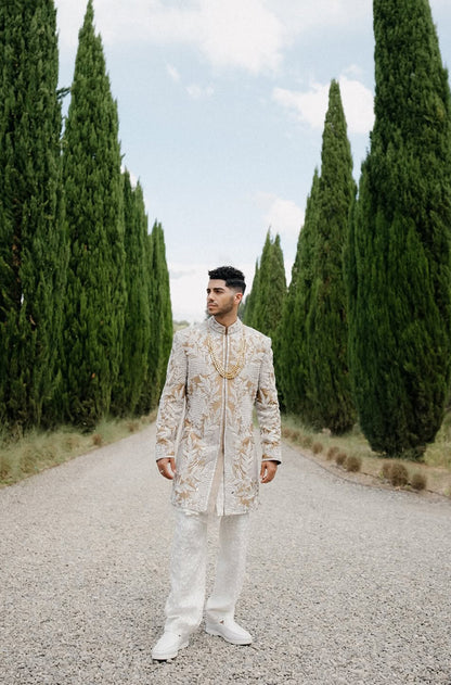 Groom: Mena Massoud in our Ivory & Beige Embroidered  Sherwani Set