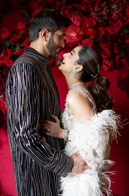 Bride: Ahana Raheja & Groom: Yash Patel in our Ivory & Ebony Ensemble