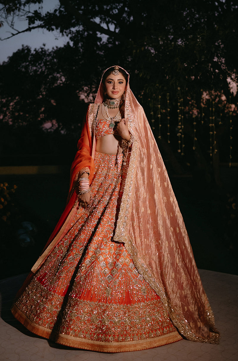 Bride: Aashna Shroff in our Evara Blush & Orange Raw Silk Lehenga Set