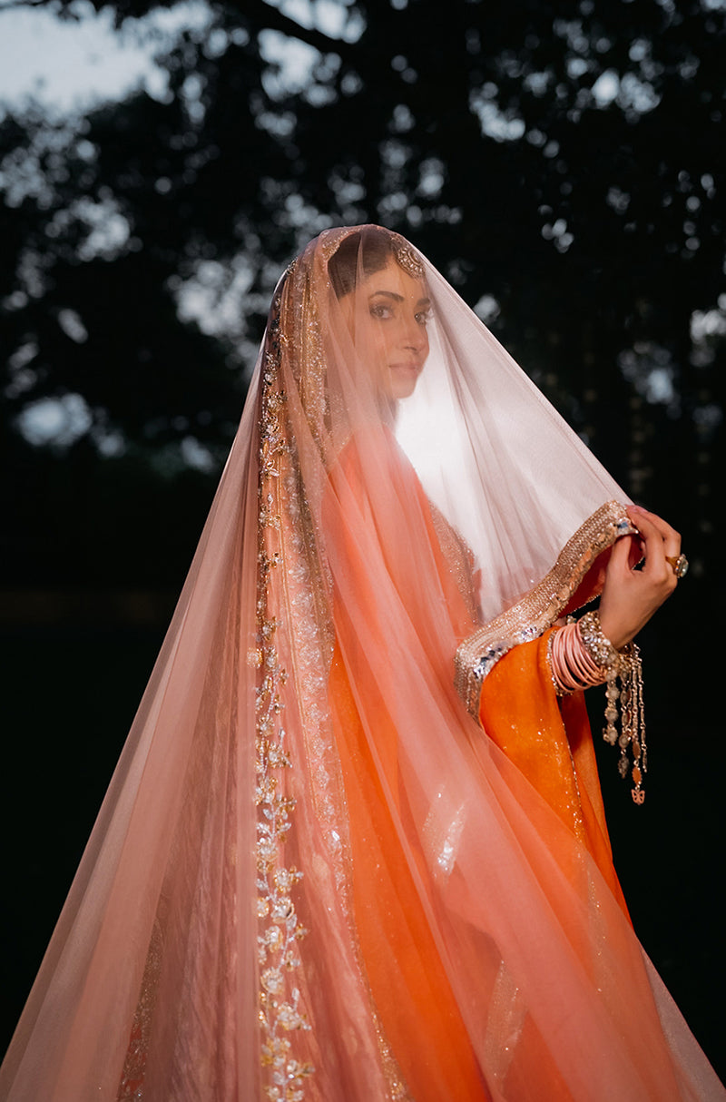 Bride: Aashna Shroff in our Evara Blush & Orange Raw Silk Lehenga Set