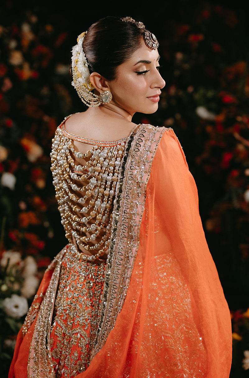 Bride: Aashna Shroff in our Evara Blush & Orange Raw Silk Lehenga Set
