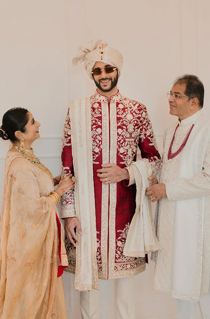 Groom: Yash Patel in our Red Embroidered Sherwani Set